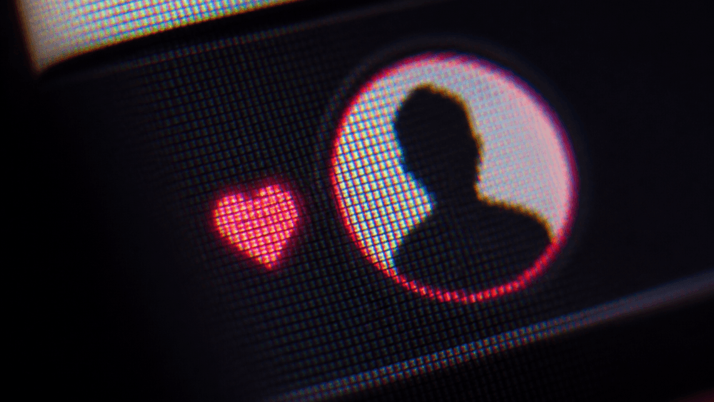 Heart icon next to a silhouette profile picture